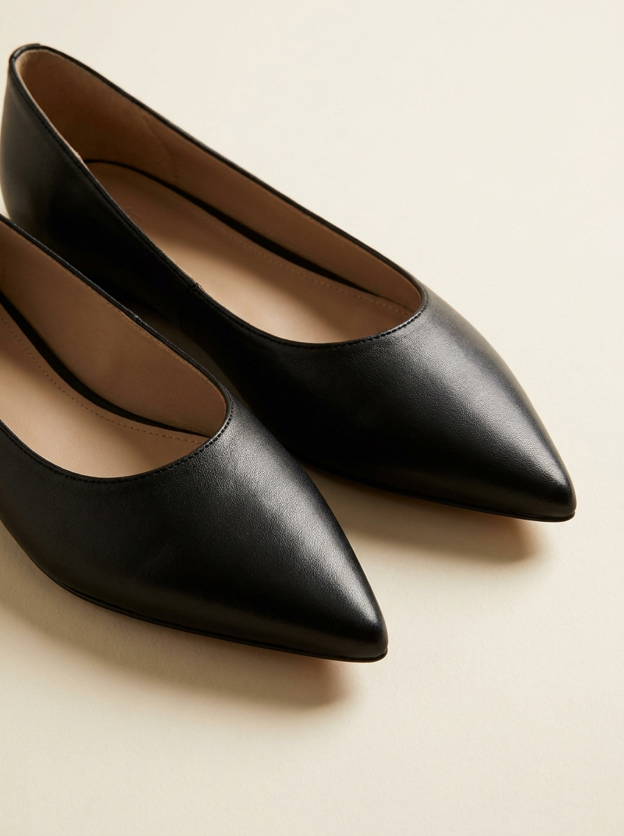 Black pointed flats